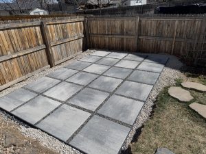 Pavers with rocks in between the pavers. evenly set out